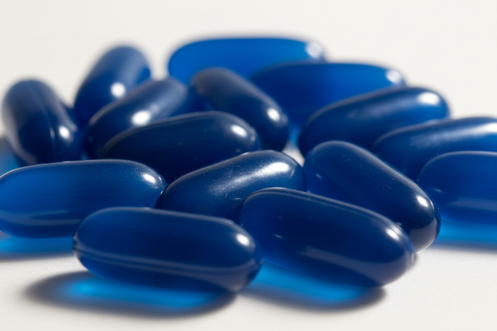 blue supplements capsules closeup